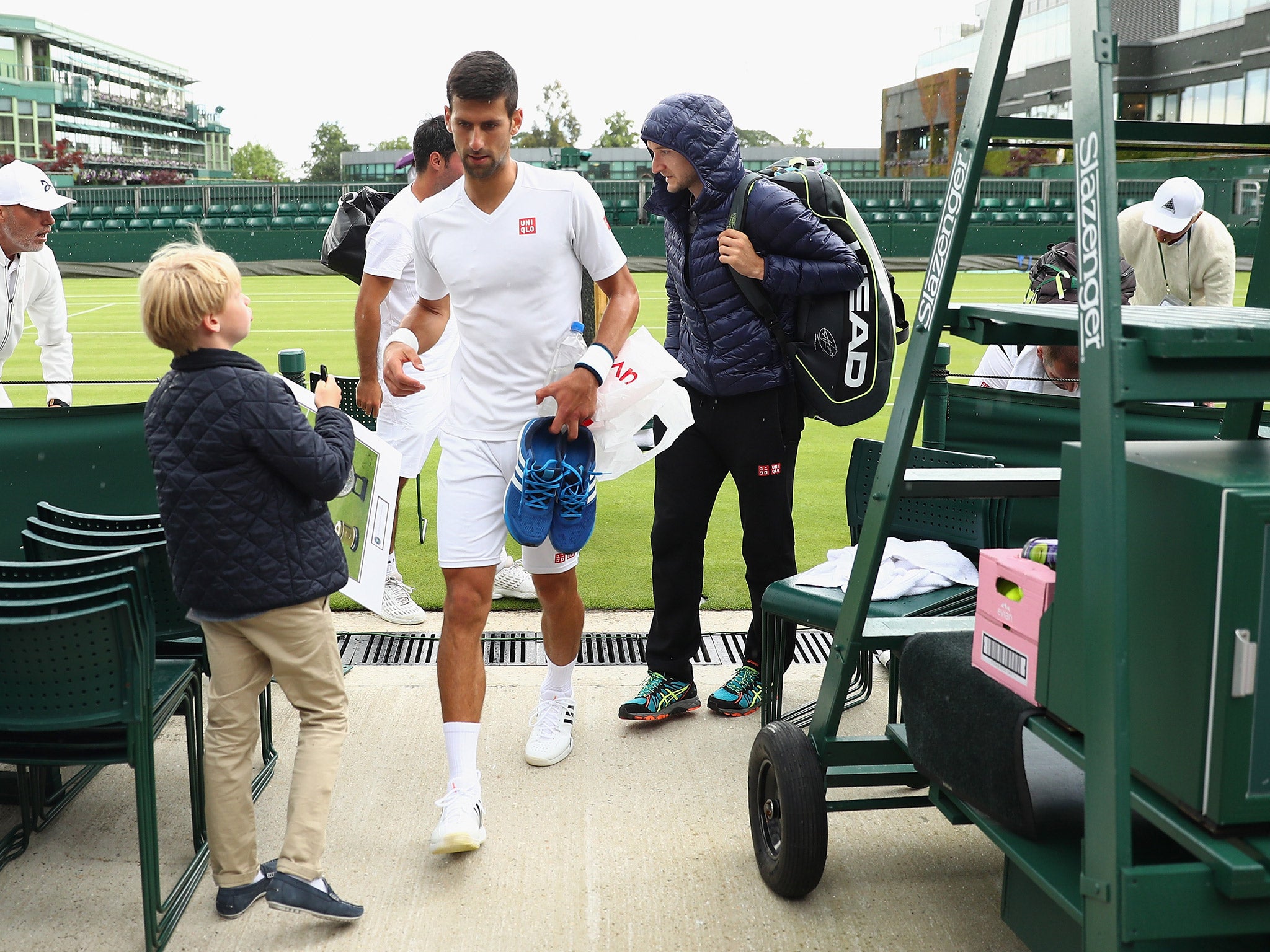 Novak Djokovic trains at Wimbledon ahead of this year's tournament