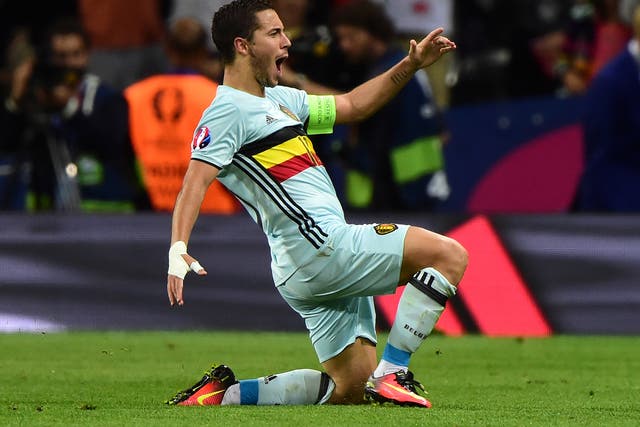 Eden Hazard celebrates scoring Belgium's third goal against Hungary