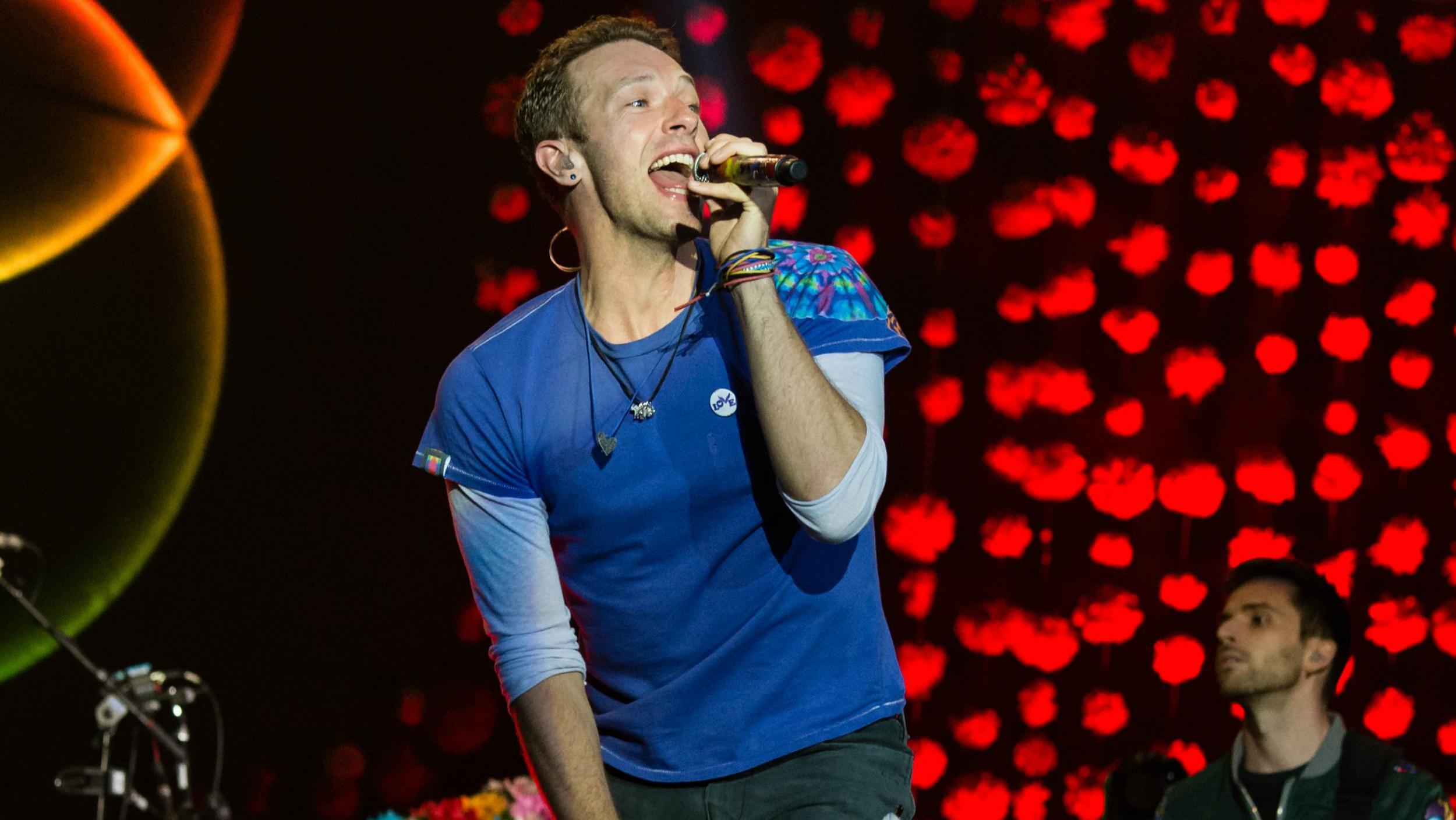 Coldplay perform on the Pyramid Stage on Sunday night of Glastonbury Festival