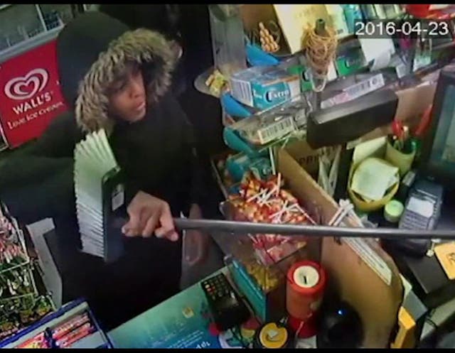 Teenage boys rob newsagents in London with a plastic broom