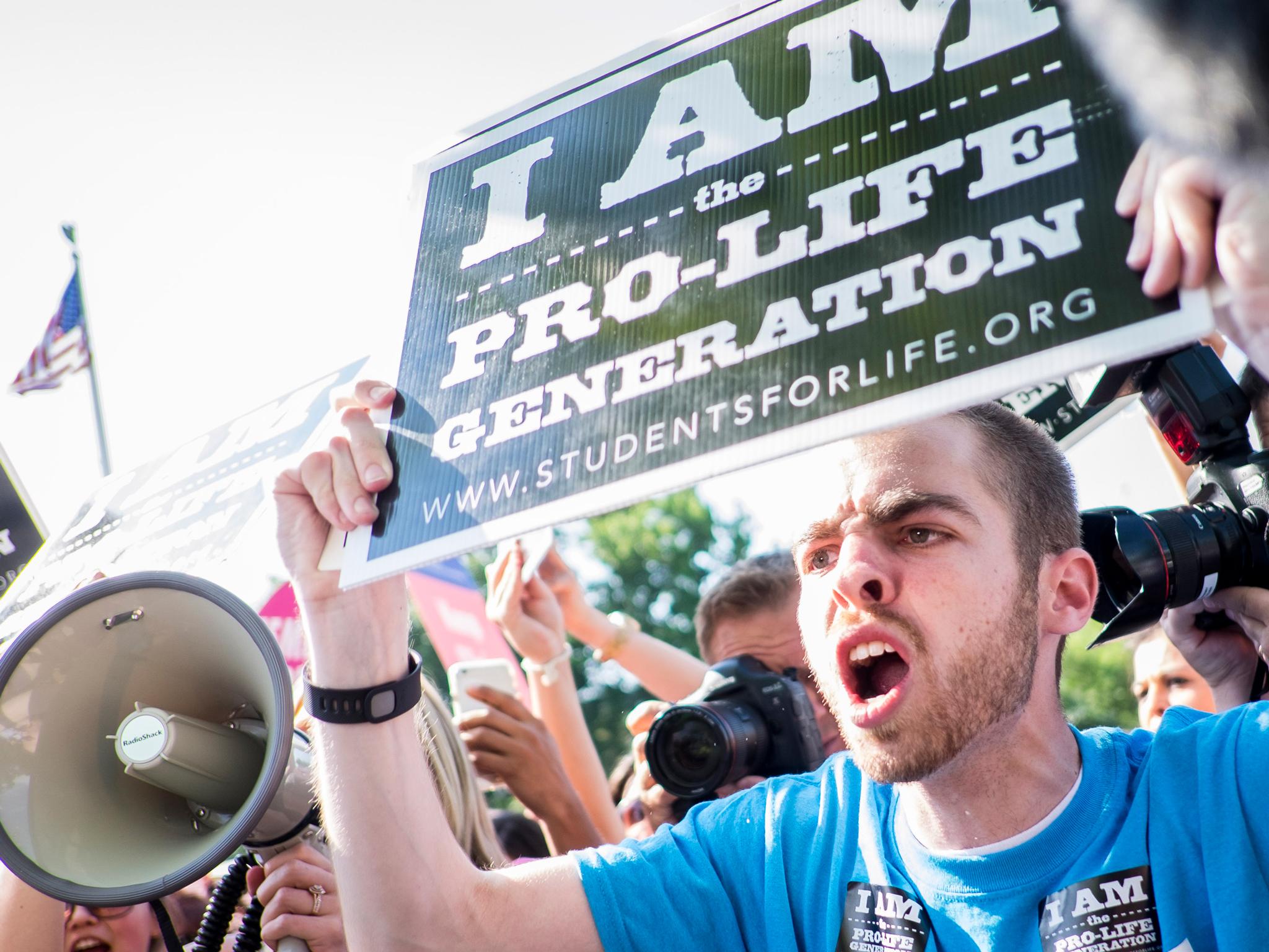 Students for Life counter demonstrate outside of the Supreme Court