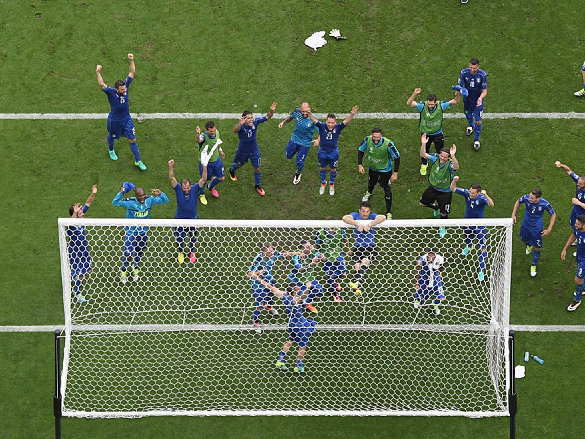 The Italians celebrate in front of their supporters