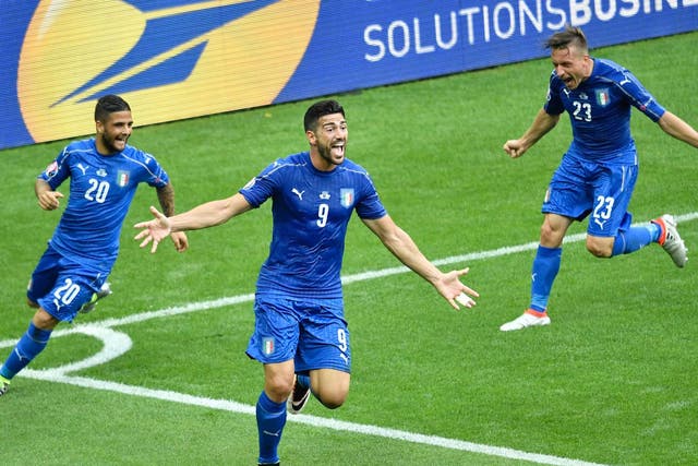 Graziano Pelle wheels away delighted after scoring for Italy during Euro 2016