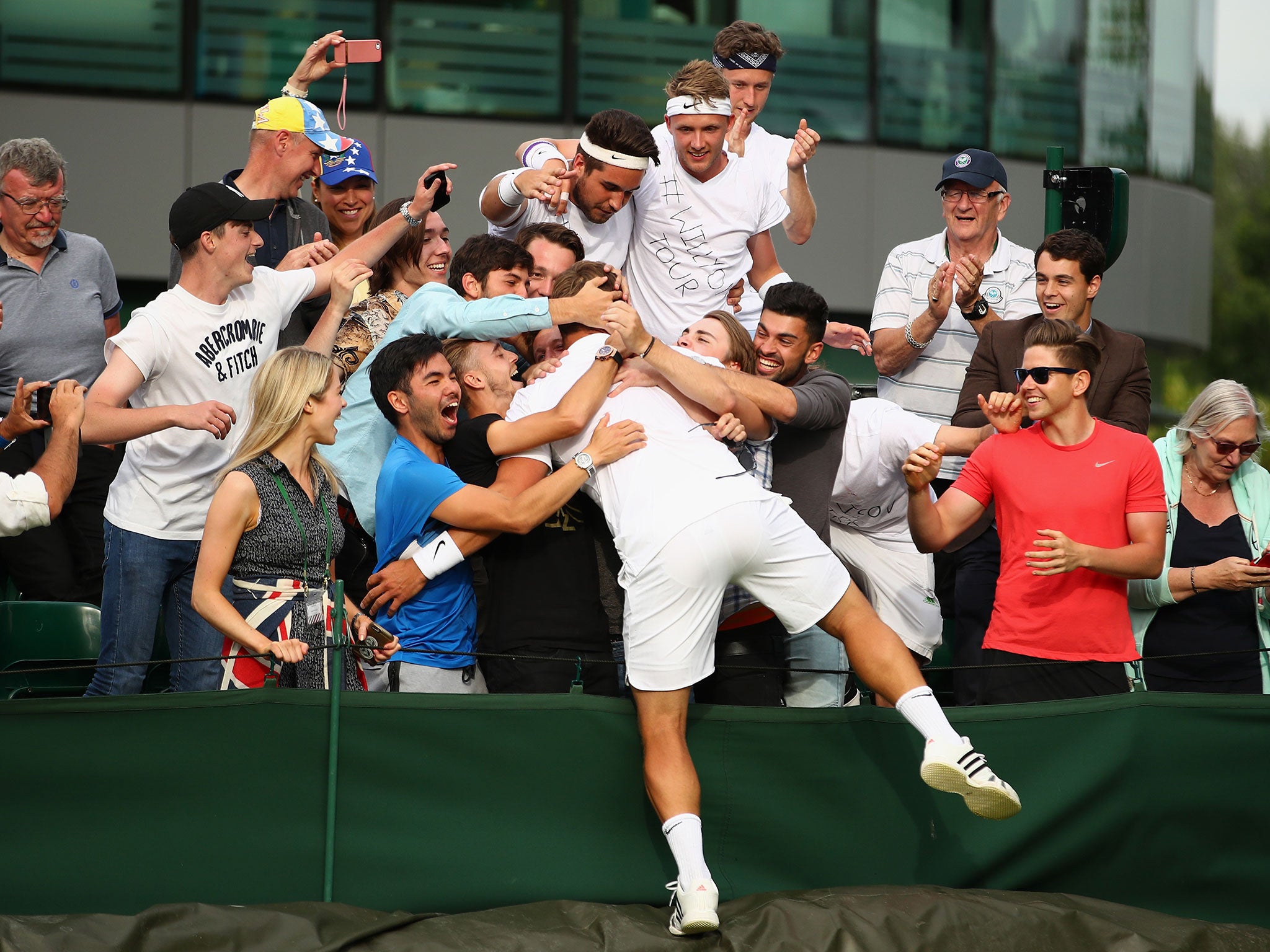 Marcus Willis jumps into the crowd after his victory