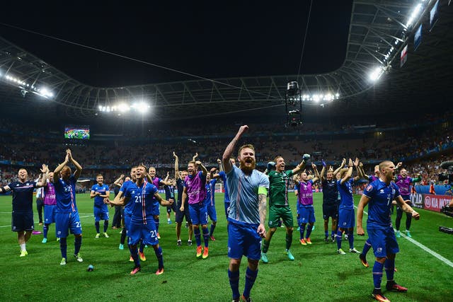 The Iceland team celebrate their phenomenal win over England