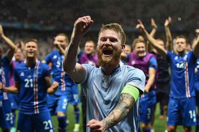 Iceland's players celebrate their historic win over England