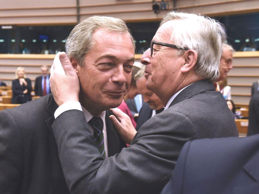 Nigel Farage shares a surprising hug with Jean Claude Juncker