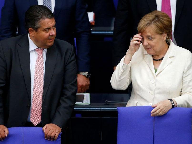German Economy Minister Sigmar Gabriel with Angela Merkel during a debate on the consequences of the Brexit in the Bundestag