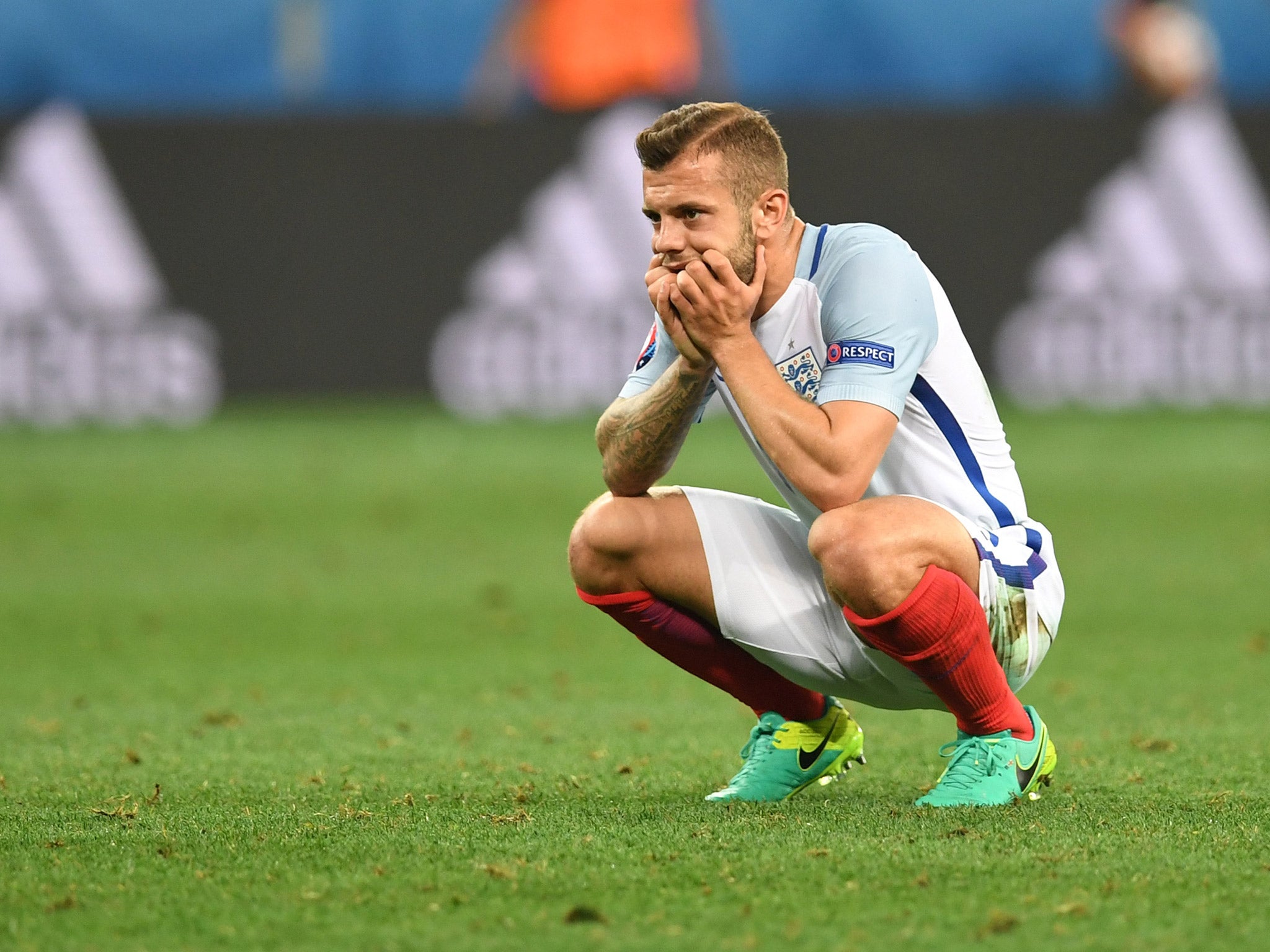 Jack Wilshere reacts to England's defeat by Iceland to eliminate them from Euro 2016