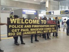 Brazilian police greet tourists with 'Welcome to Hell' sign at Rio airport