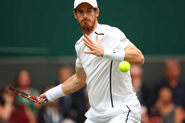 Andy Murray in action on his opening match at Wimbledon