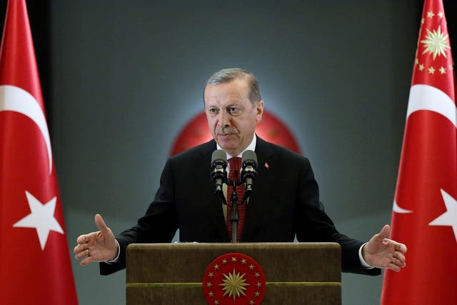 President Erdogan makes a speech during an iftar event in Ankara, yesterday