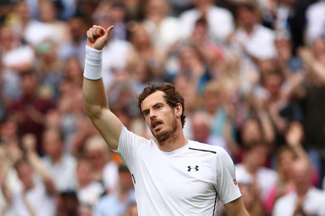 Andy Murray celebrates on Centre Court after getting off to a winning start at this year's Wimbledon