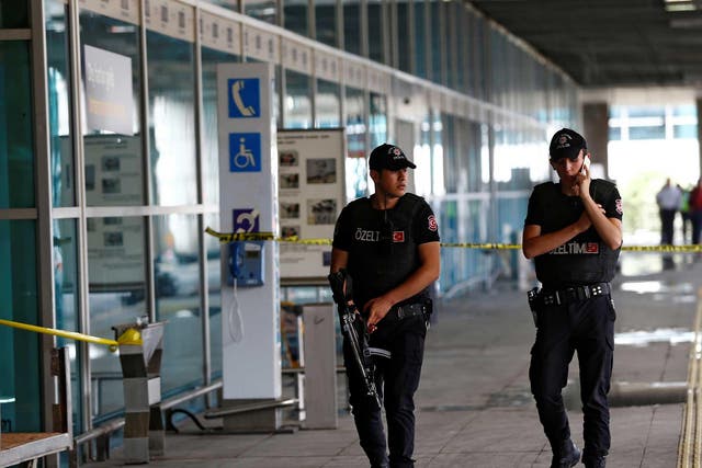 Officers patrol Ataturk airport near the site of Tuesday’s attack