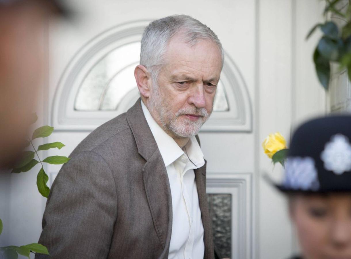 Mr Corbyn leaves his home yesterday morning