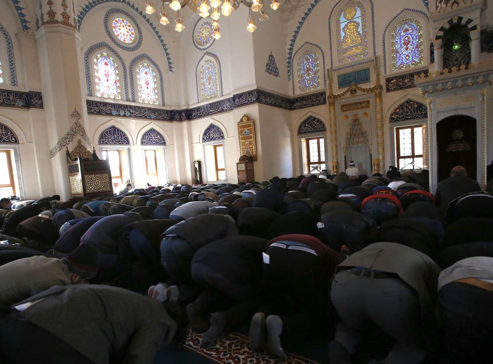Muslims in Japan pray for the release of two Japanese citizens being held captive by Islamic State militants, during Friday prayers at a mosque in Tokyo January 23, 2015