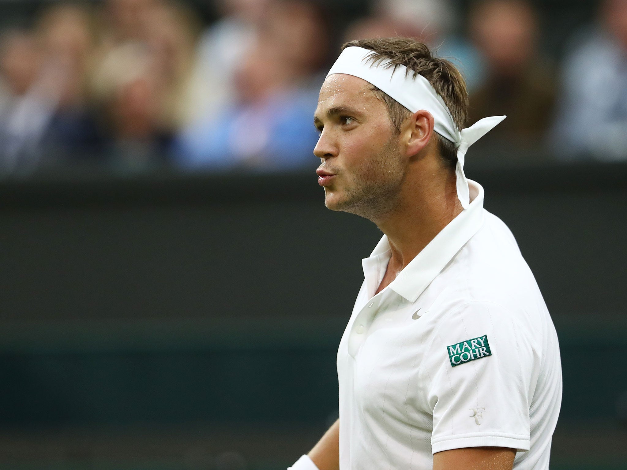 Marcus Willis rues a close miss during defeat to Roger Federer