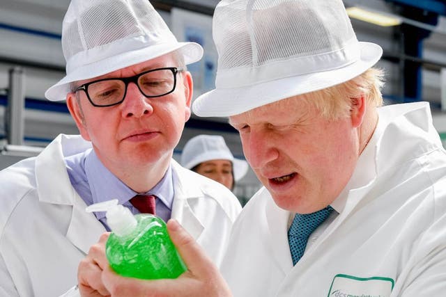 Michael Gove and Boris Johnson visit a factory in Stratford during the EU referendum campaign