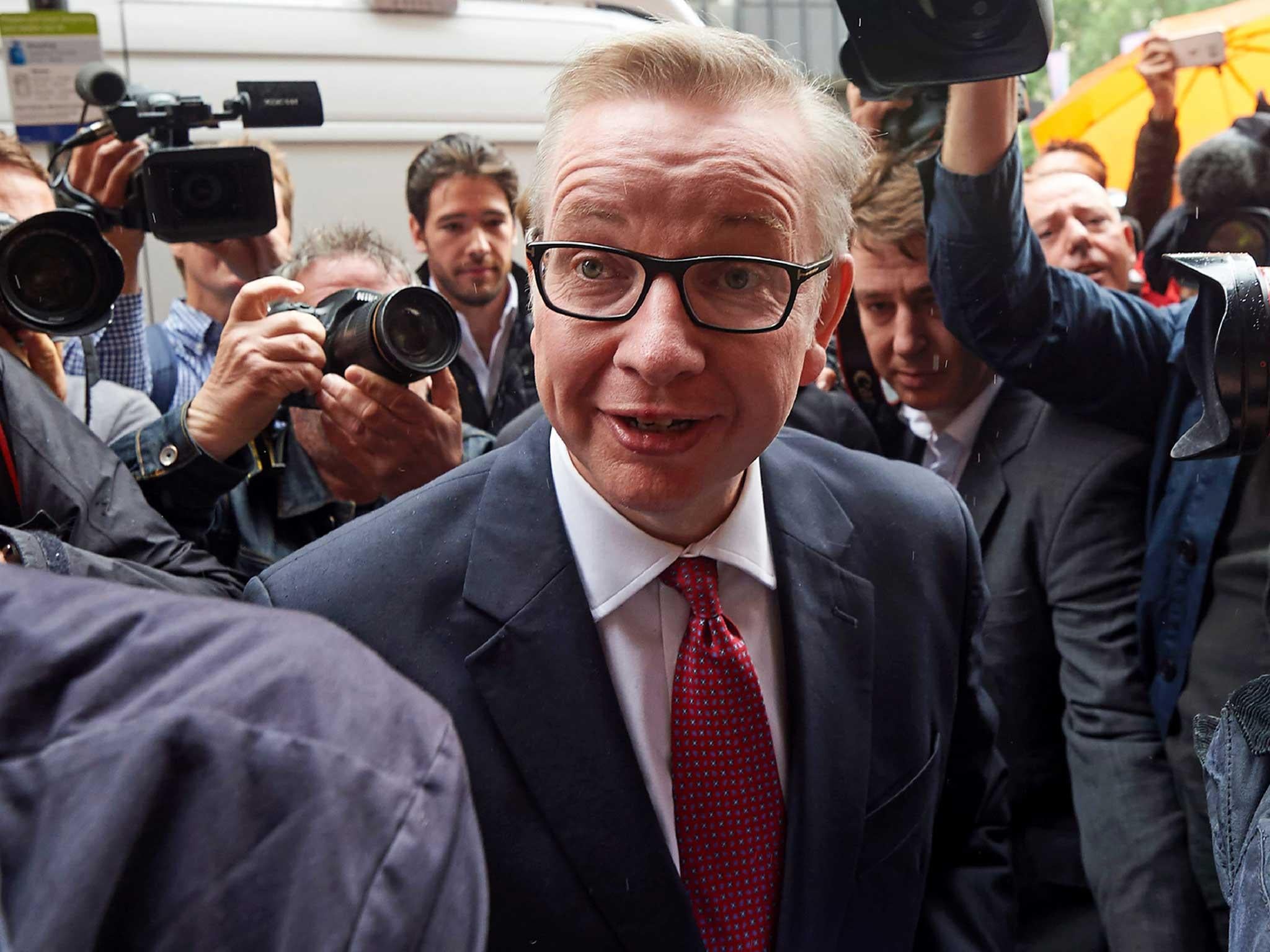 Michael Gove arrives to address a press conference in central London (Getty )