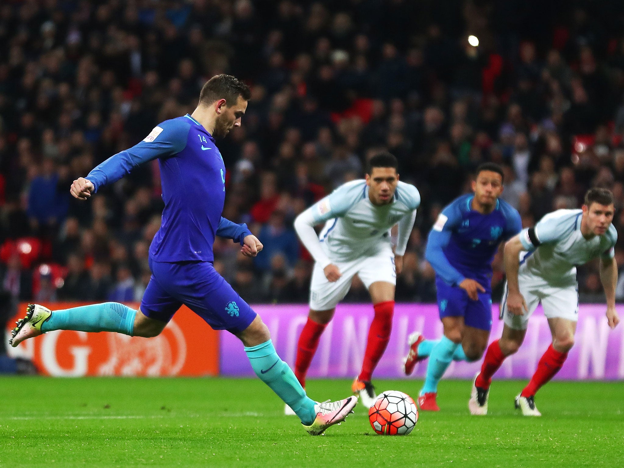 Janssen converts from the penalty spot in Holland's victory against England