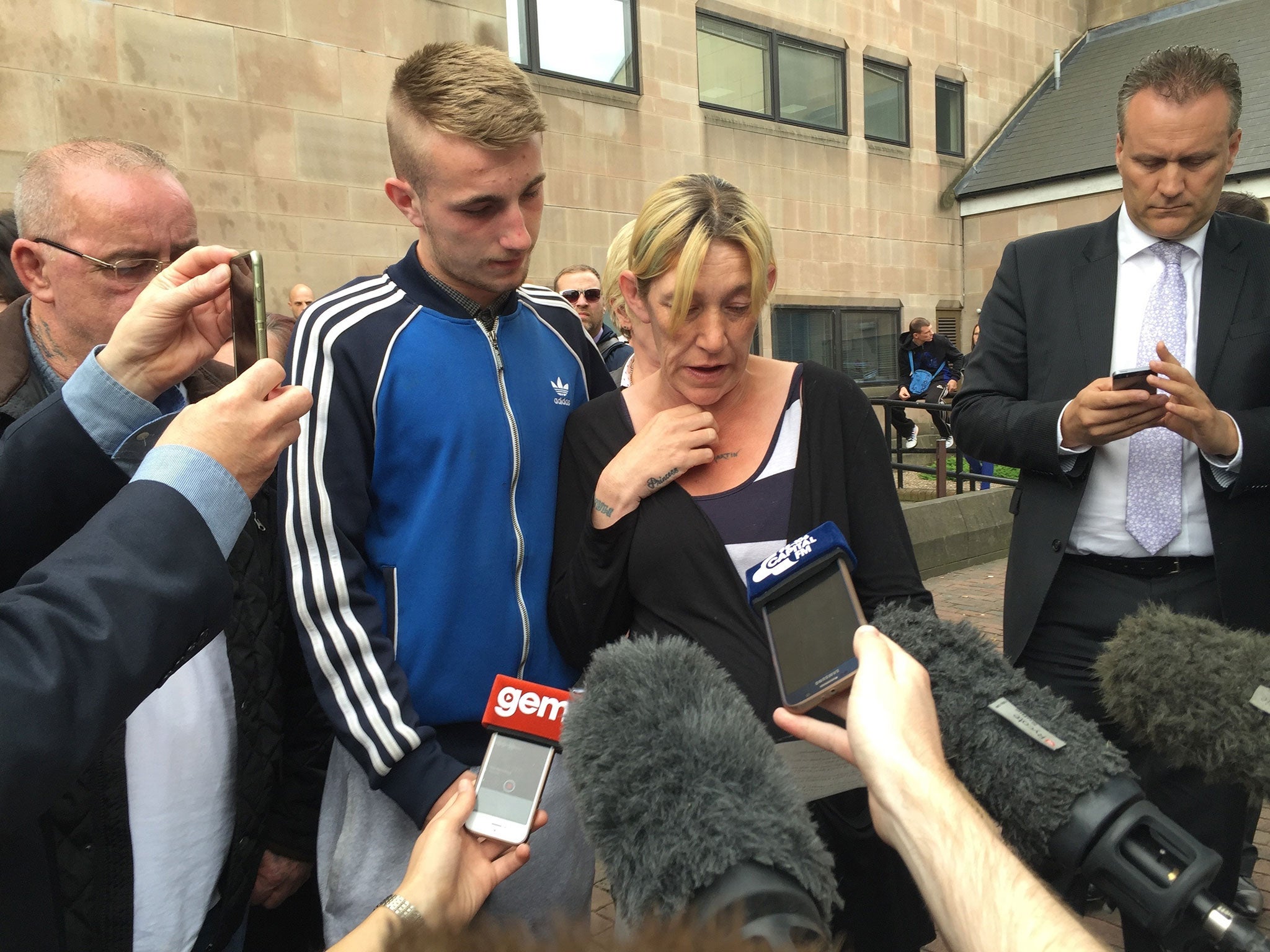 Kayleigh Haywood's mother Stephanie, with the teenager's brother Kyle, outside Nottingham Crown Court