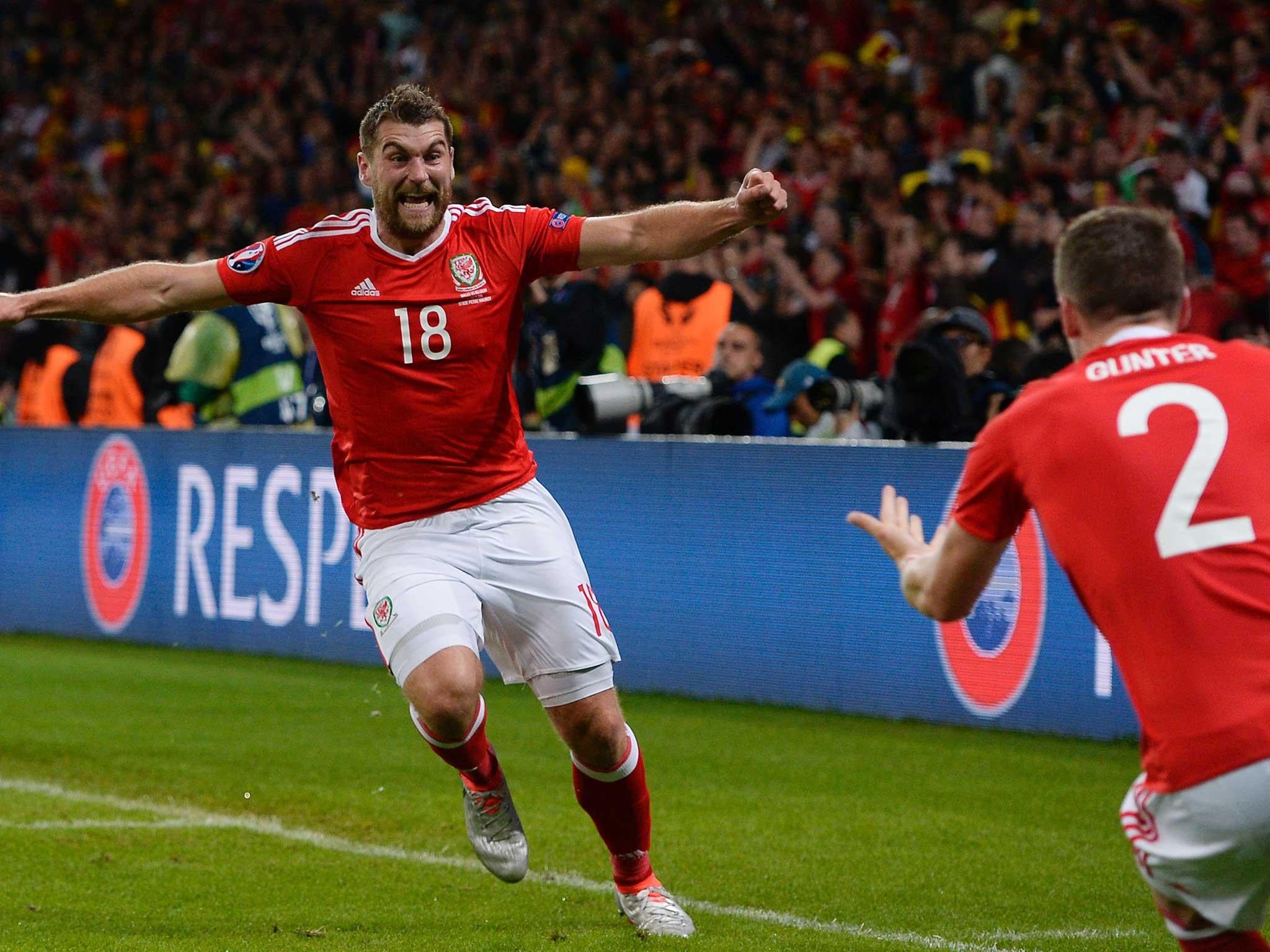 Sam Vokes is the picture of joy after scoring Wales' third