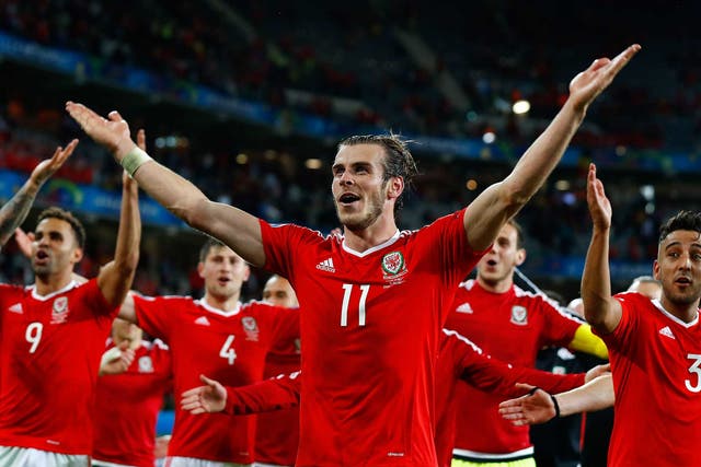 Bale greets the visiting Wales fans in Lille at full-time