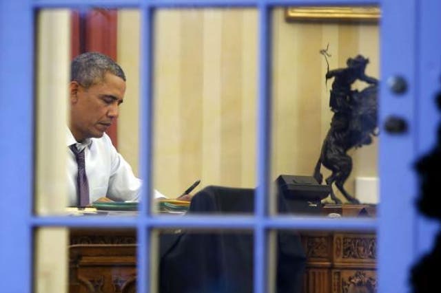 Barack Obama spends a typical evening hard at work, sleeping for just five hours