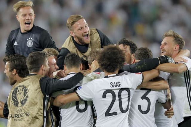 Germany celebrate their quarter-final victory after a tense penalty shoot-out