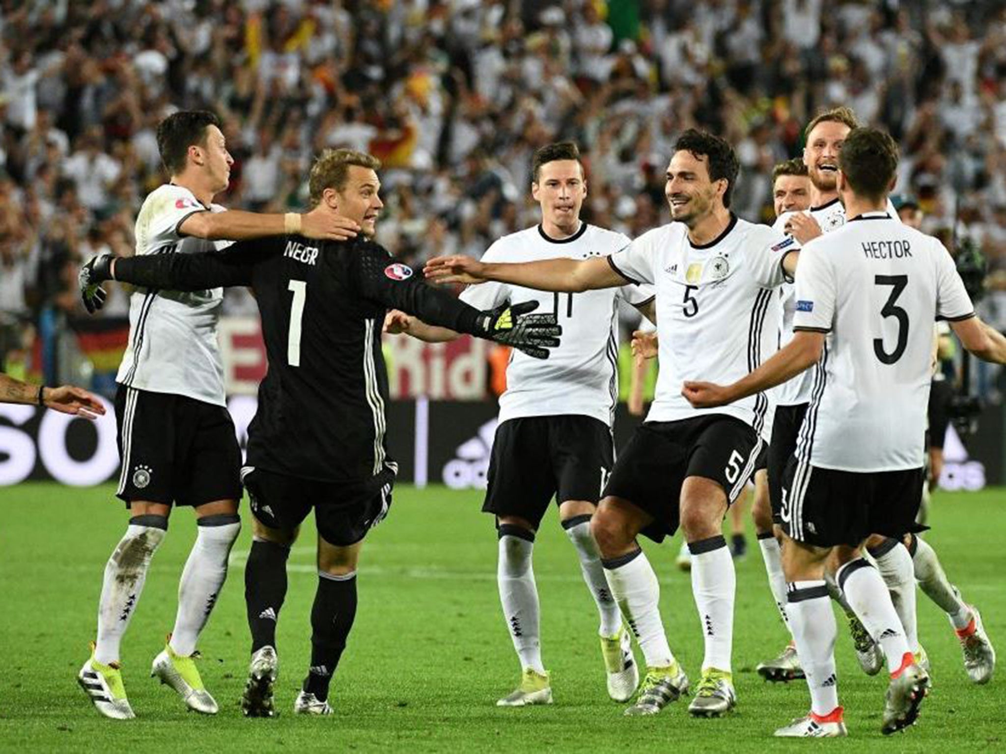 Manuel Neuer leads the German celebrations after the penalty shoot-out success