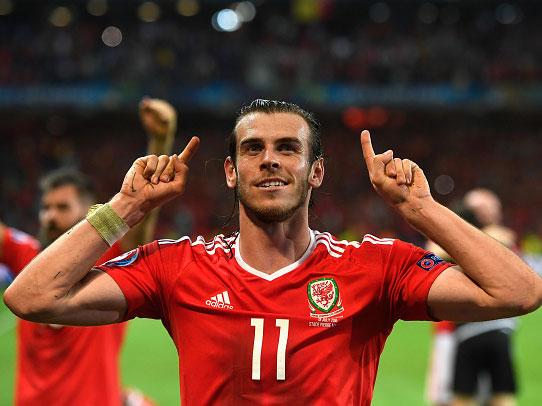 Gareth Bale celebrates the quarter-final win against Belgium