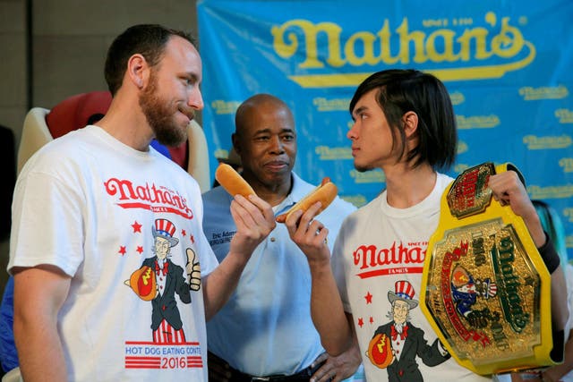 World record-holder Joey 'Jaws' Chestnut (left) and title-holder Matt 'Megatoad' Stonie face off at Friday's weigh-in for the 2016 Nathan's Famous Fourth of July hot dog eating contest