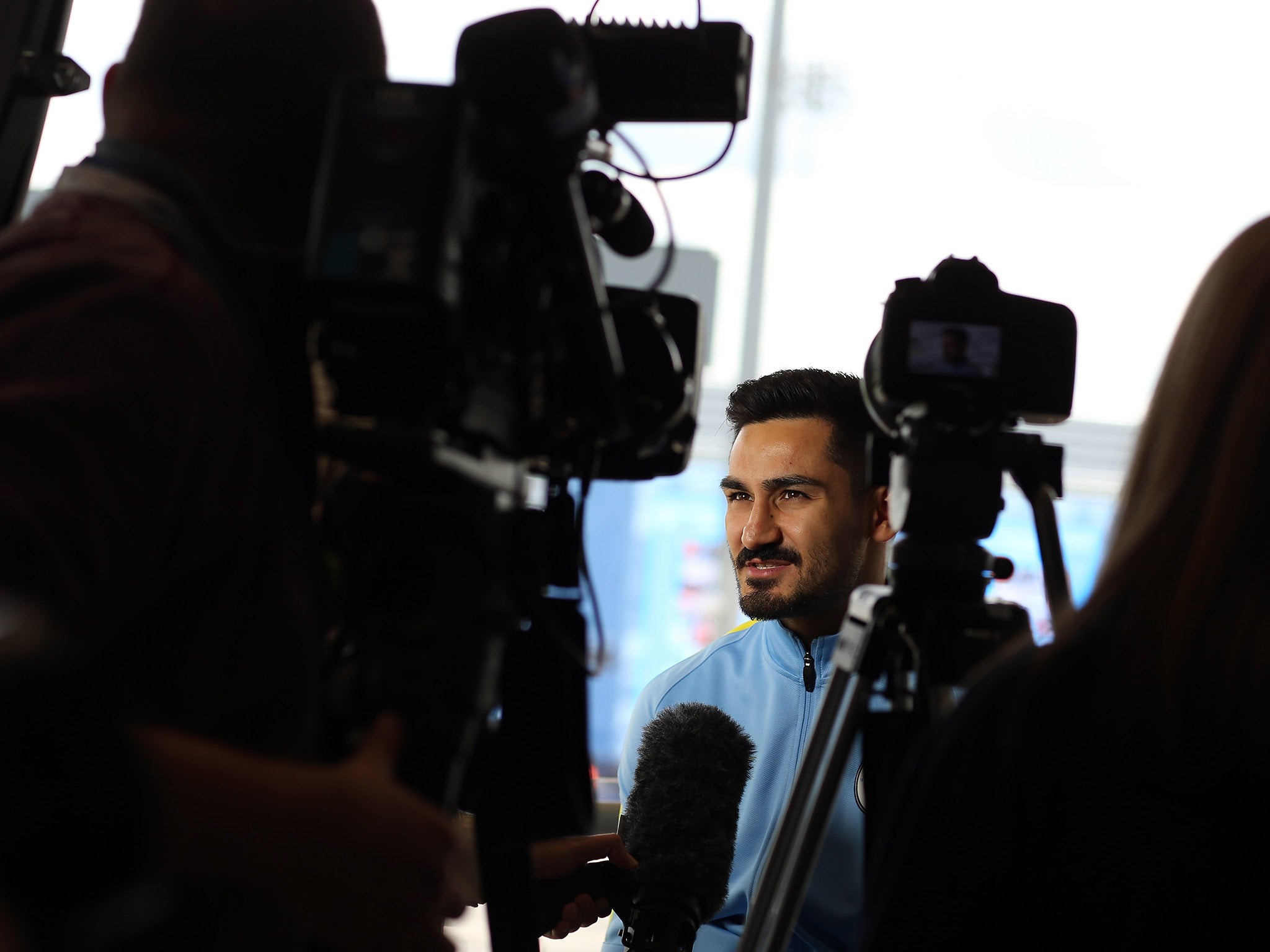 Ilkay Gundogan speaks to the media as a Manchester City player