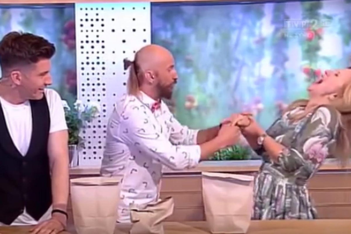Polish TV presenter impaled by nail when live magic trick goes wrong | The Independent | The Independent