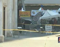 Police shoot dead man who tries to drive through chicken wing festival