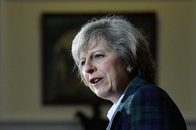 Theresa May has refused to say that she will not deport EU nationals from the UK after Brexit