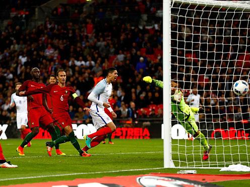 Chris Smalling reacts after his late header settles last month's friendly against Portugal (Getty)