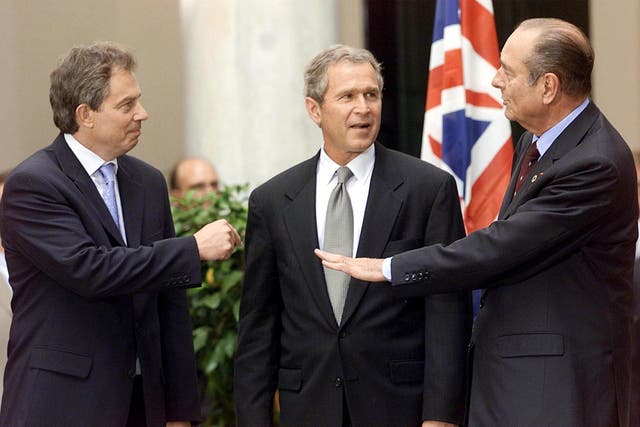 Jacques Chirac, George W Bush and Tony Blair in conversation at the G8 meeting in Italy, 20 July, 2001