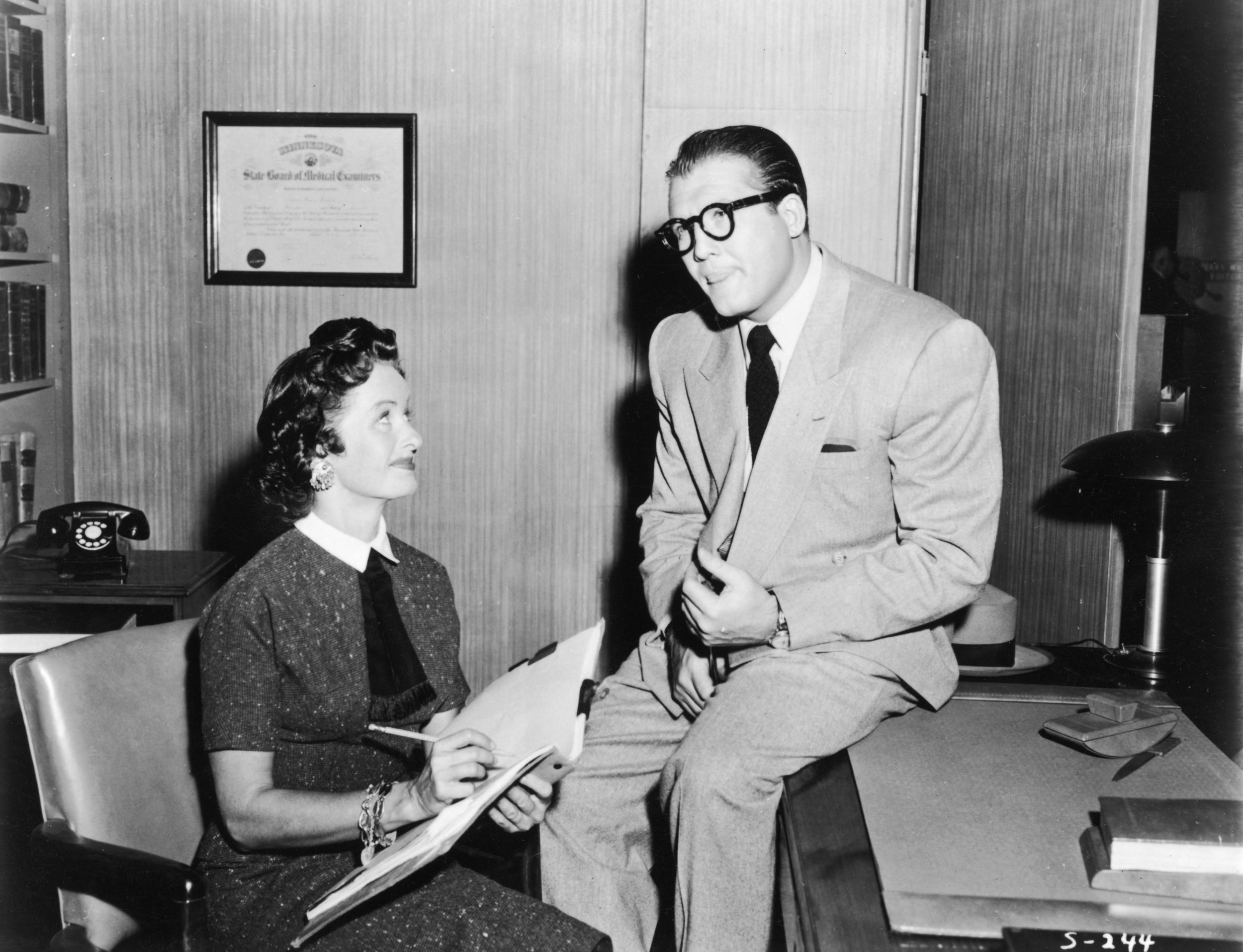 Noel Neill as Lois Lane and George Reeves as Clark Kent in the Adventures of Superman in 1955