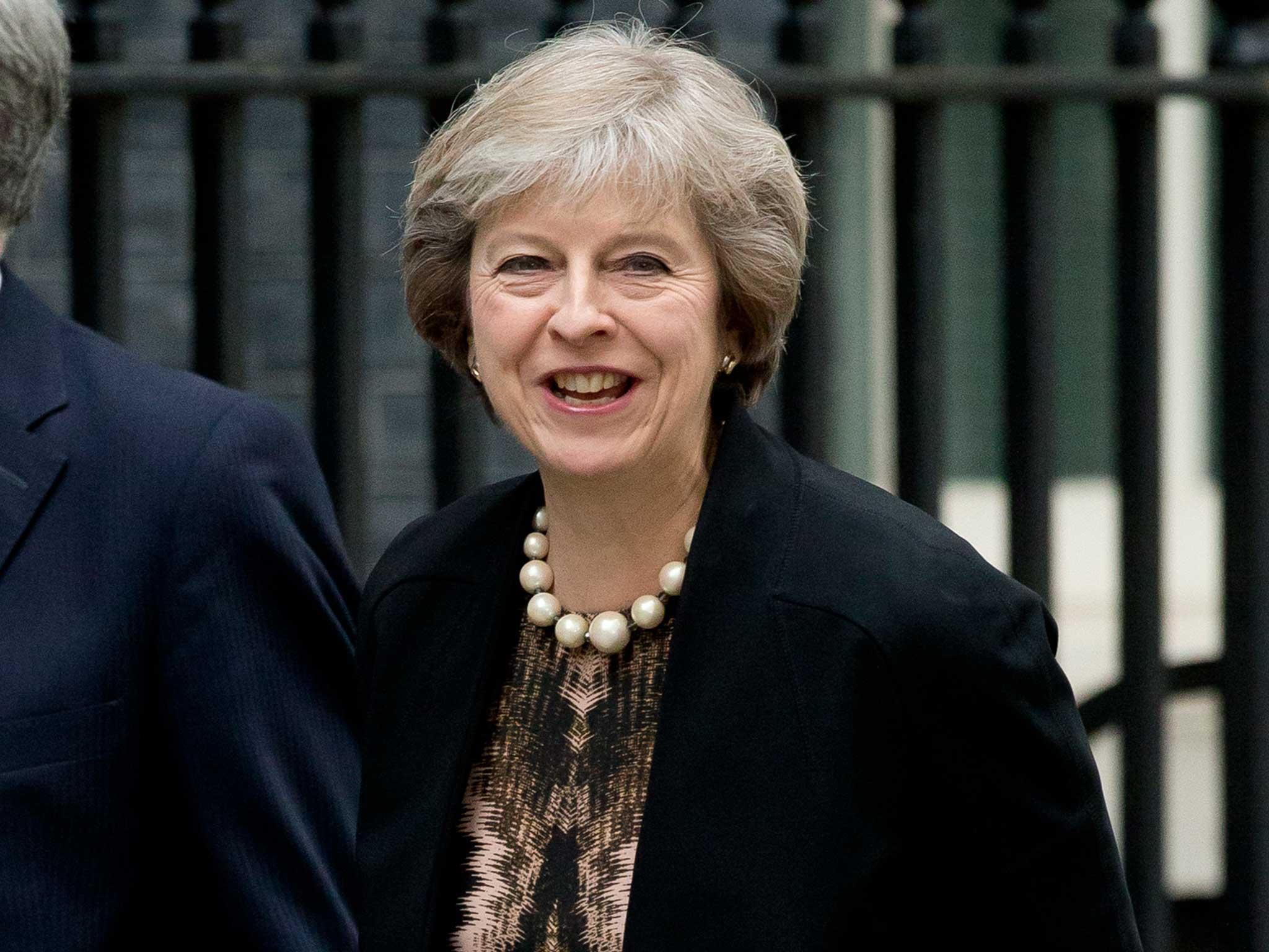Theresa May arrives for a cabinet meeting at 10 Downing Street in London