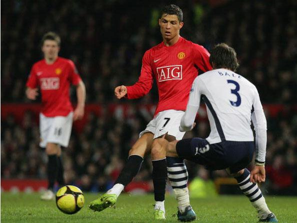 Gareth Bale watches on as Cristiano Ronaldo passes against Tottenham at Old Trafford (Getty)