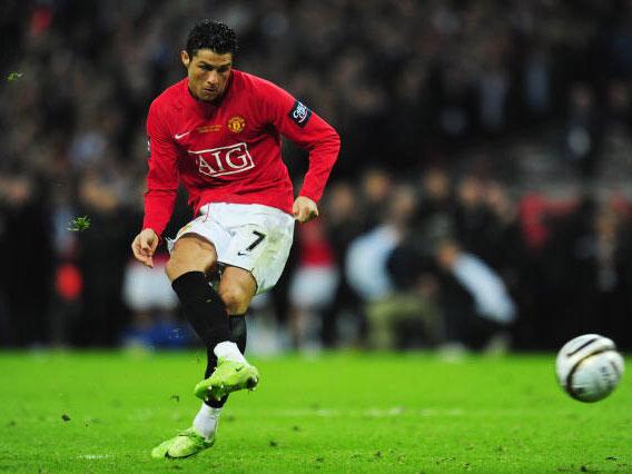 Cristiano Ronaldo scores his penalty in the shoot-out at Wembley (Getty)