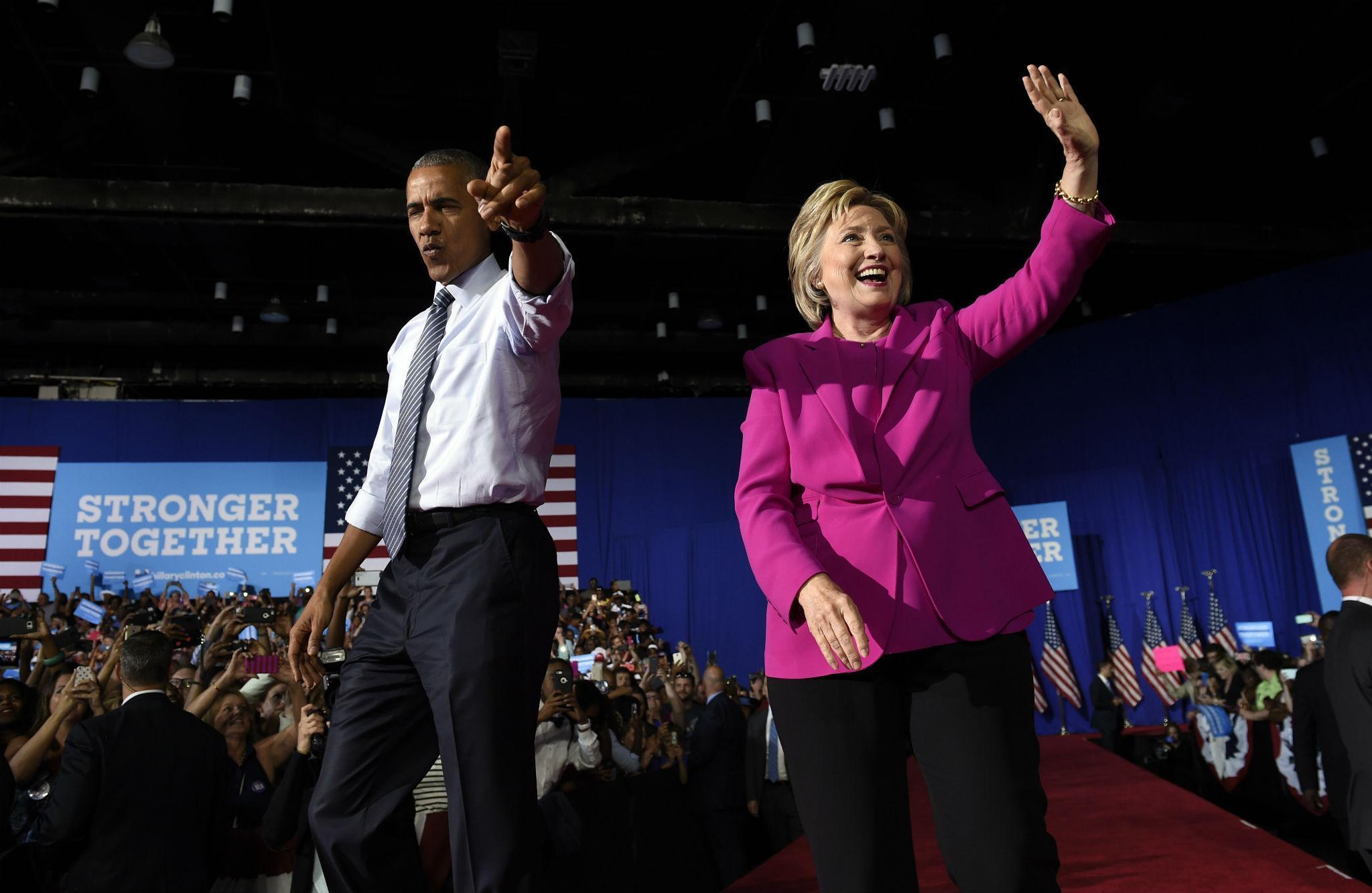 'My faith in Hillary Clinton has always been rewarded,' Mr Obama told an enthusiastic crowd in Charlotte, North Carolina