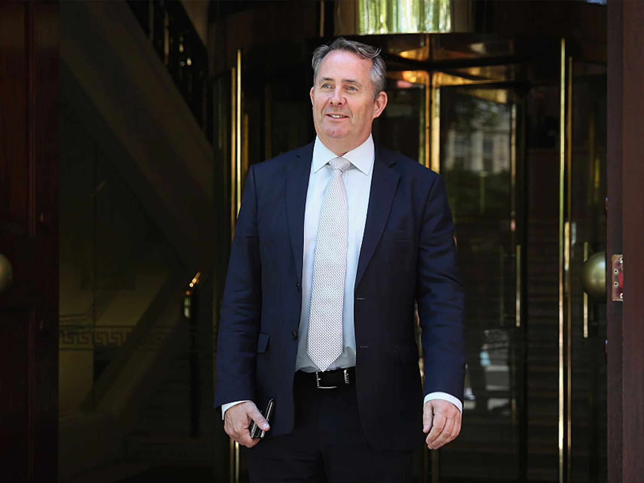 Liam Fox leaves Millbank studios yesterday