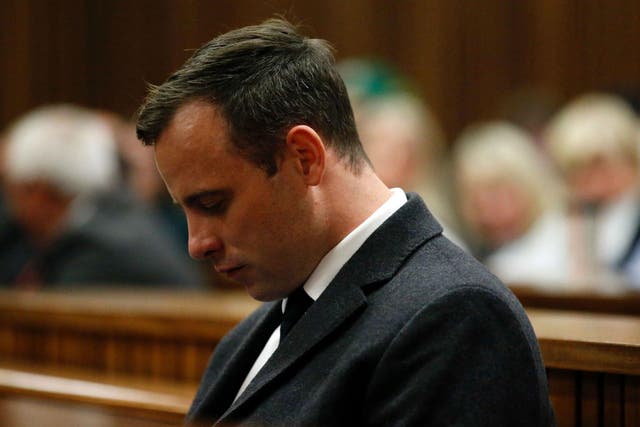 Oscar Pistorius listens to Judge Masipa's ruling in court
