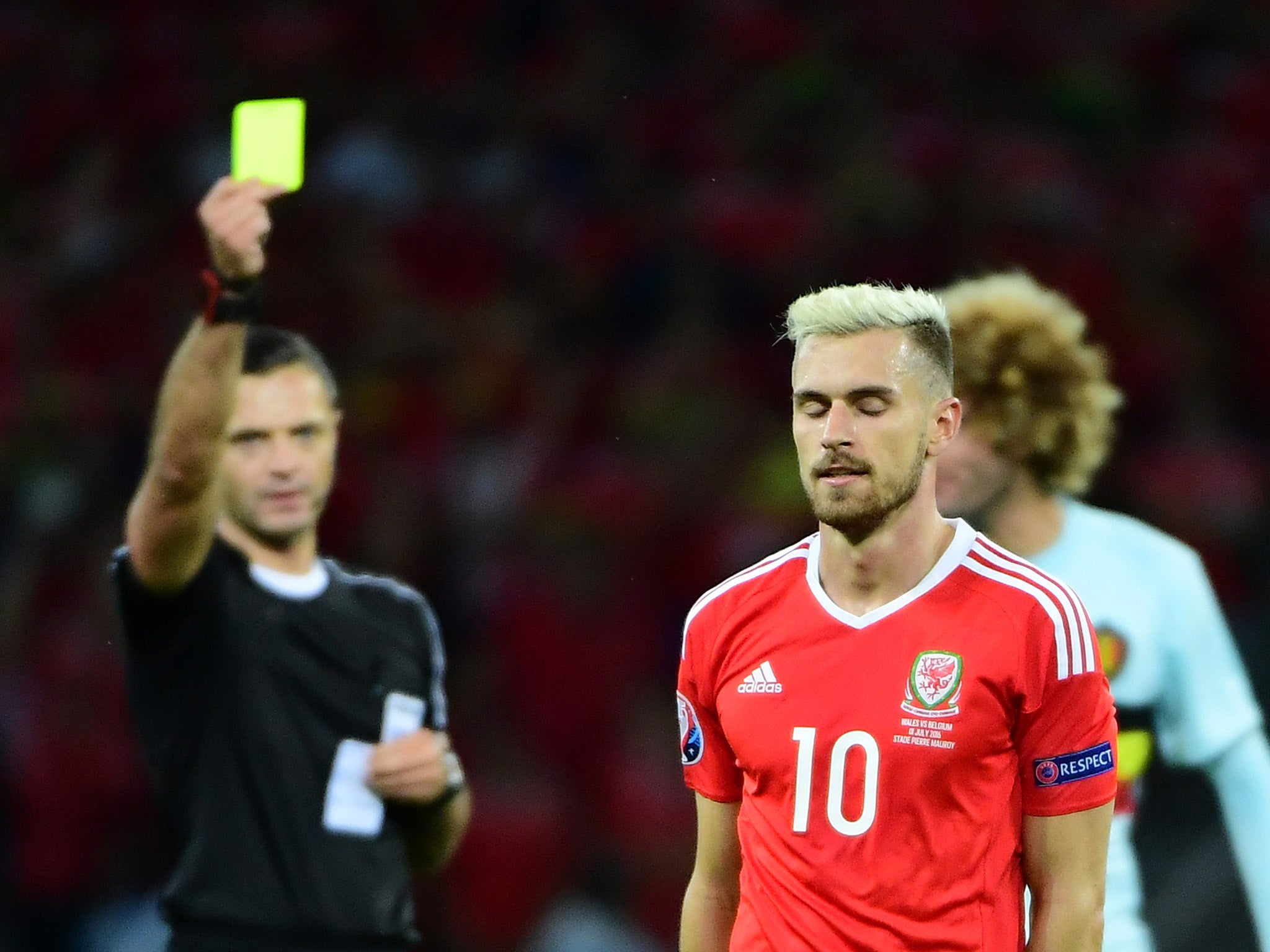 Aaron Ramsey will miss the Euro 2016 semi-final after picking up two yellow cards