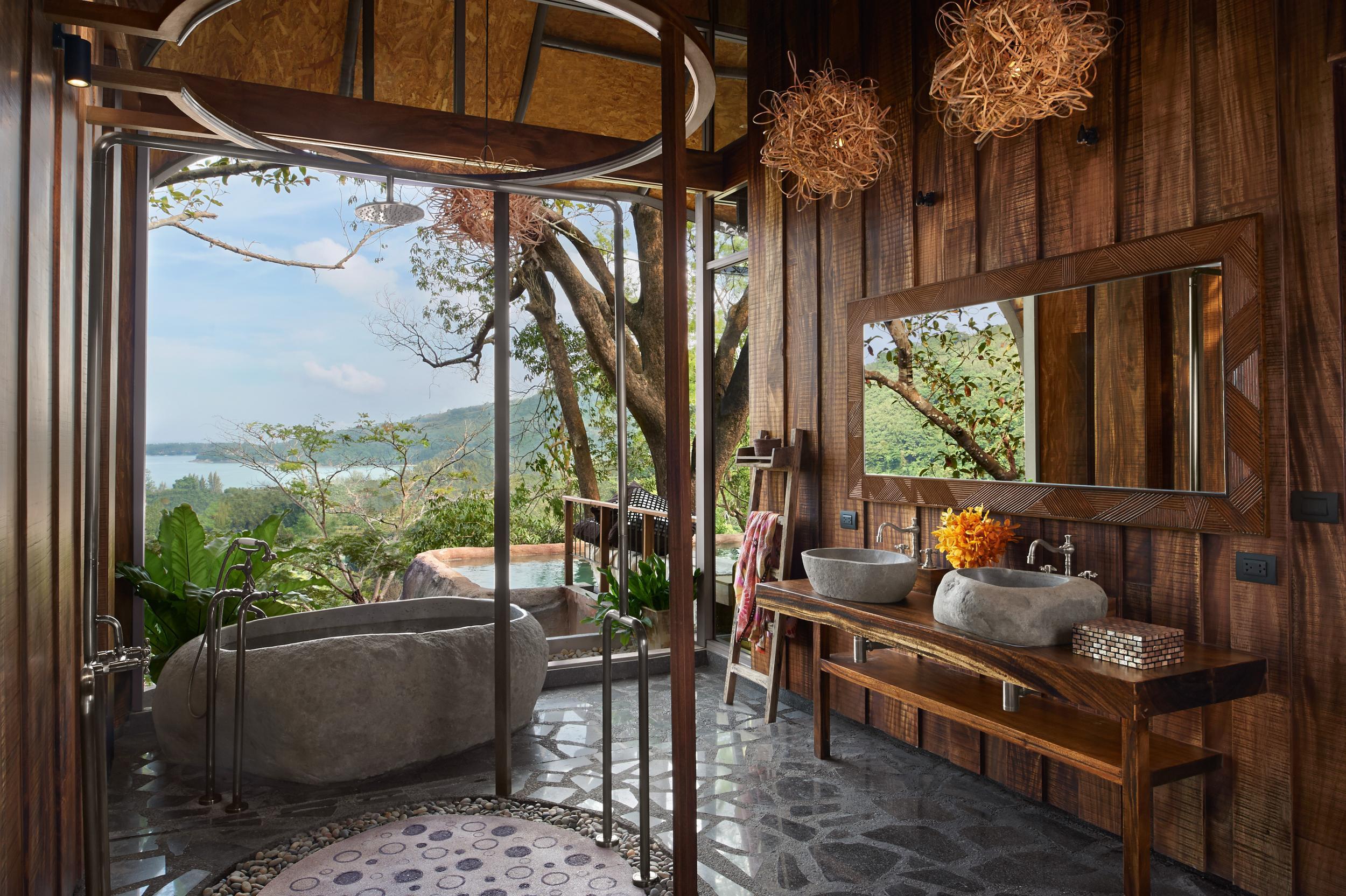 A Bird's Nest bathroom overlooking the private pool