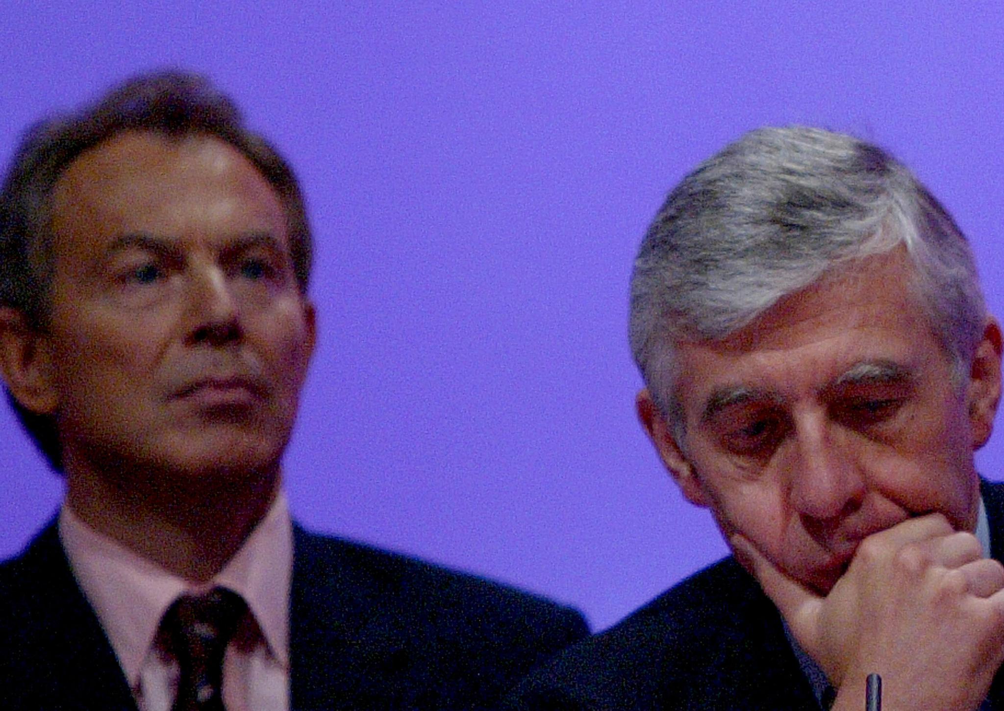 Jack Straw, Britain's Foreign Secretary, is seen next to Britain's Prime Minister Tony Blair during the fifth and final day of the Labour Party Annual Conference on September 30, 2004 in Brighton