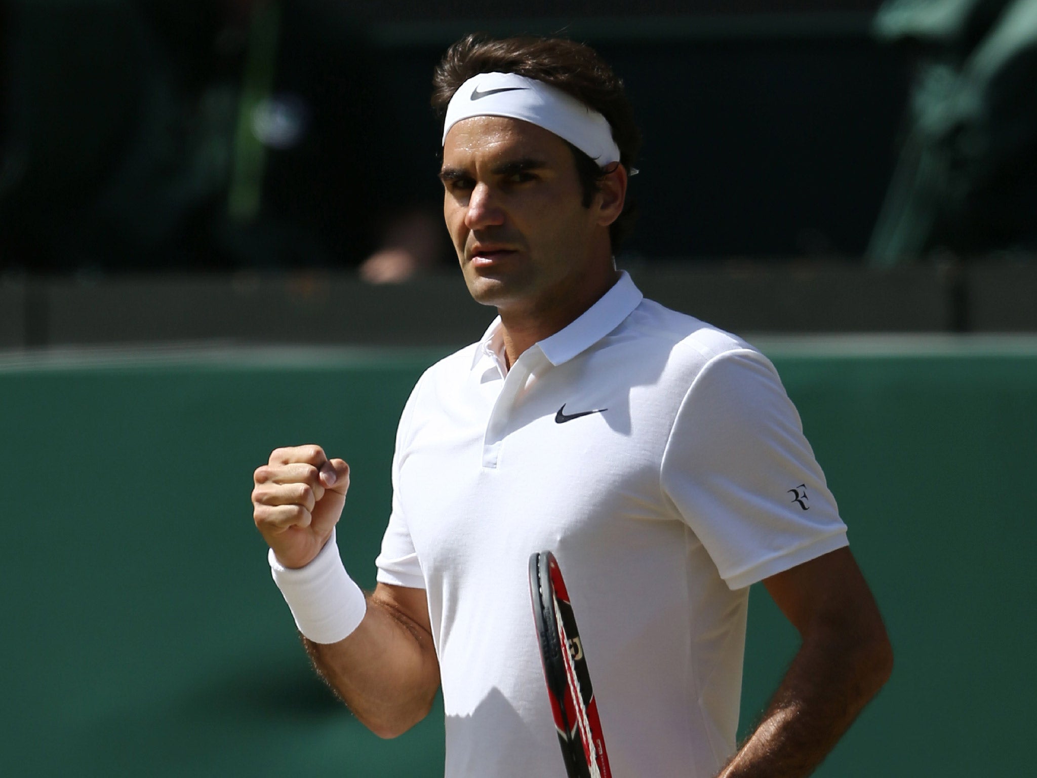 Roger Federer enjoys victory on Centre Court