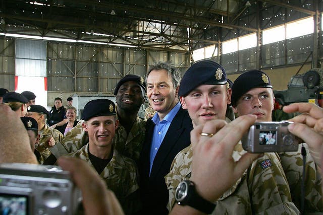 Tony Blair with troops from The Royal Logistics Corps while he visited Shaiba Logistics Base in Basra, 2005